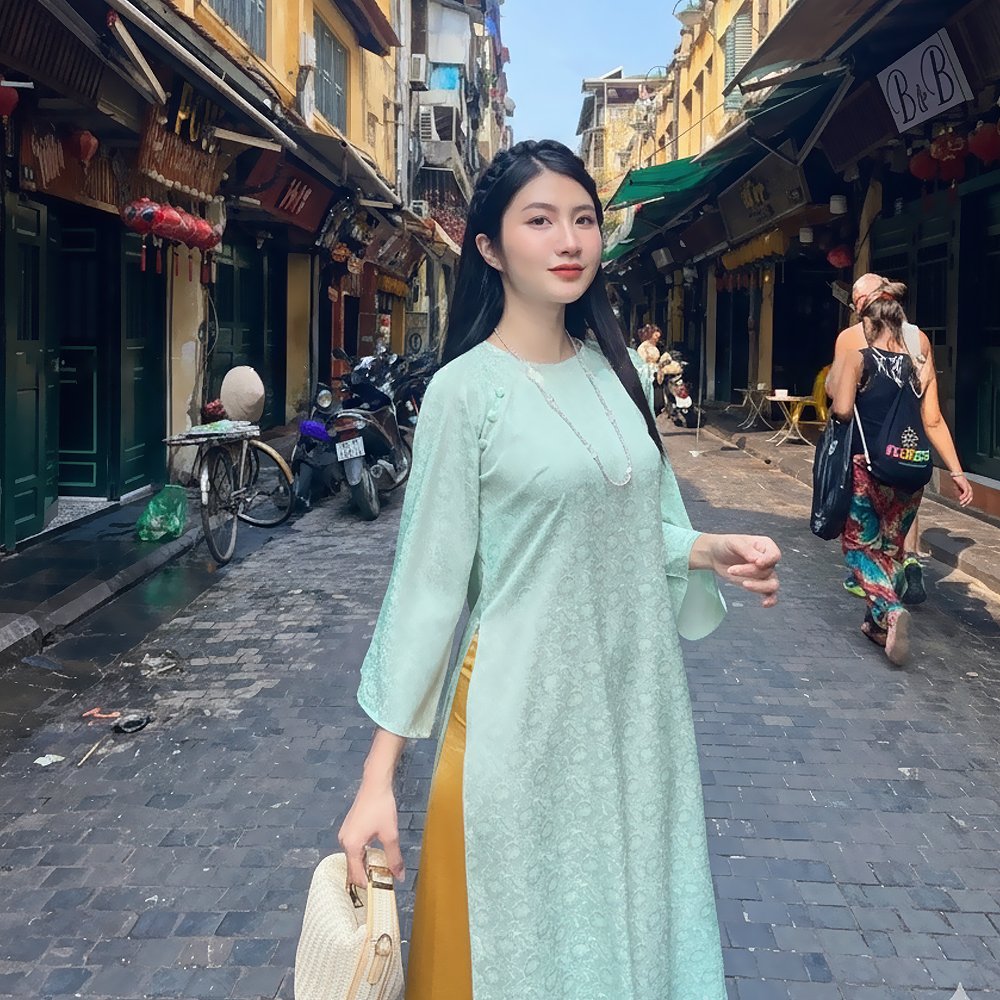 Áo dài xanh ngọc cổ tròn hoa chìm sang trọng tại Tiệm Nhà Bông